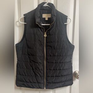 Gently used Michael Kors polyester vest. Size Medium